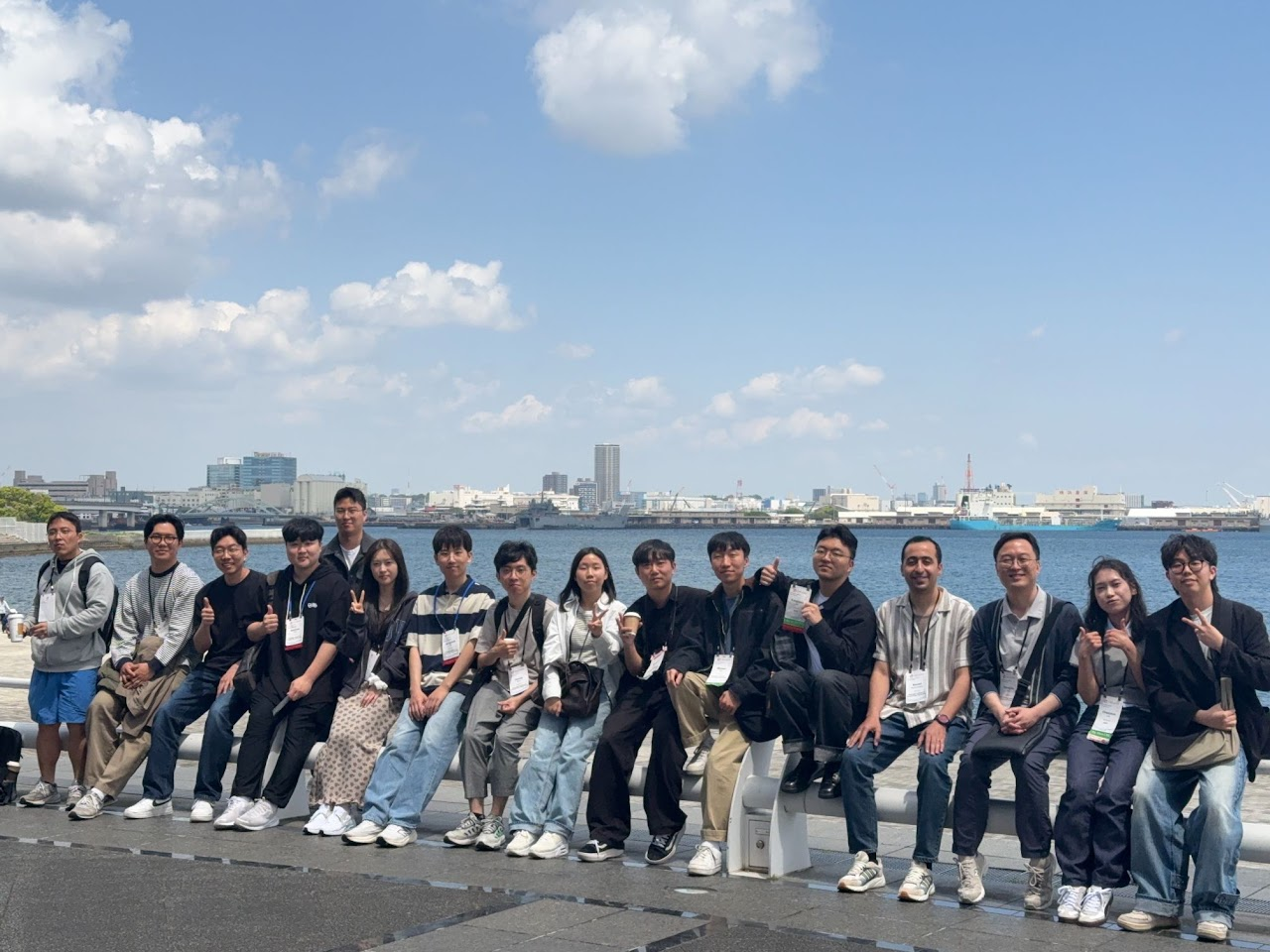 Group photo by the waterfront during the CHI 2025 conference trip.