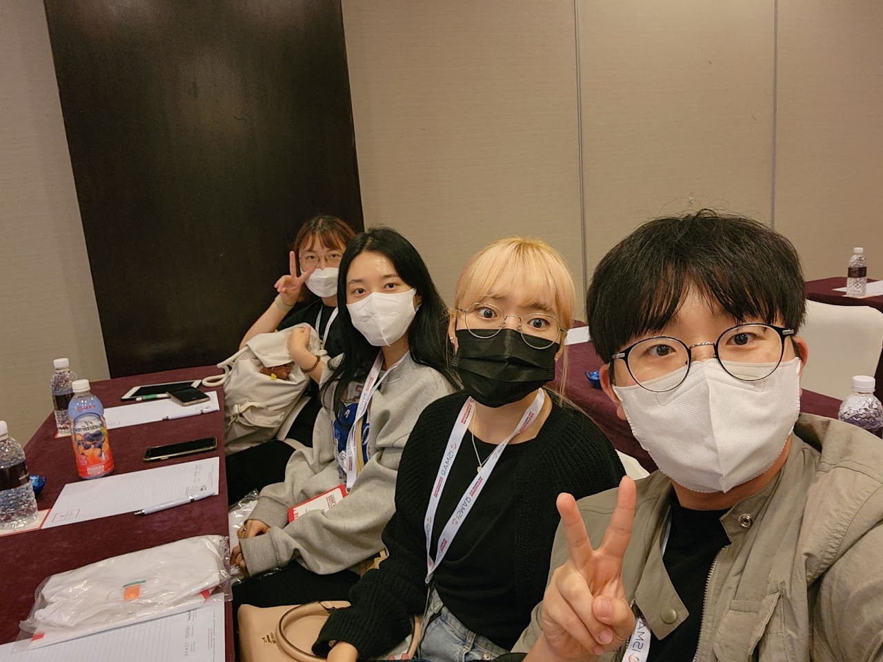 Group selfie inside a meeting room at ISMAR 2022.