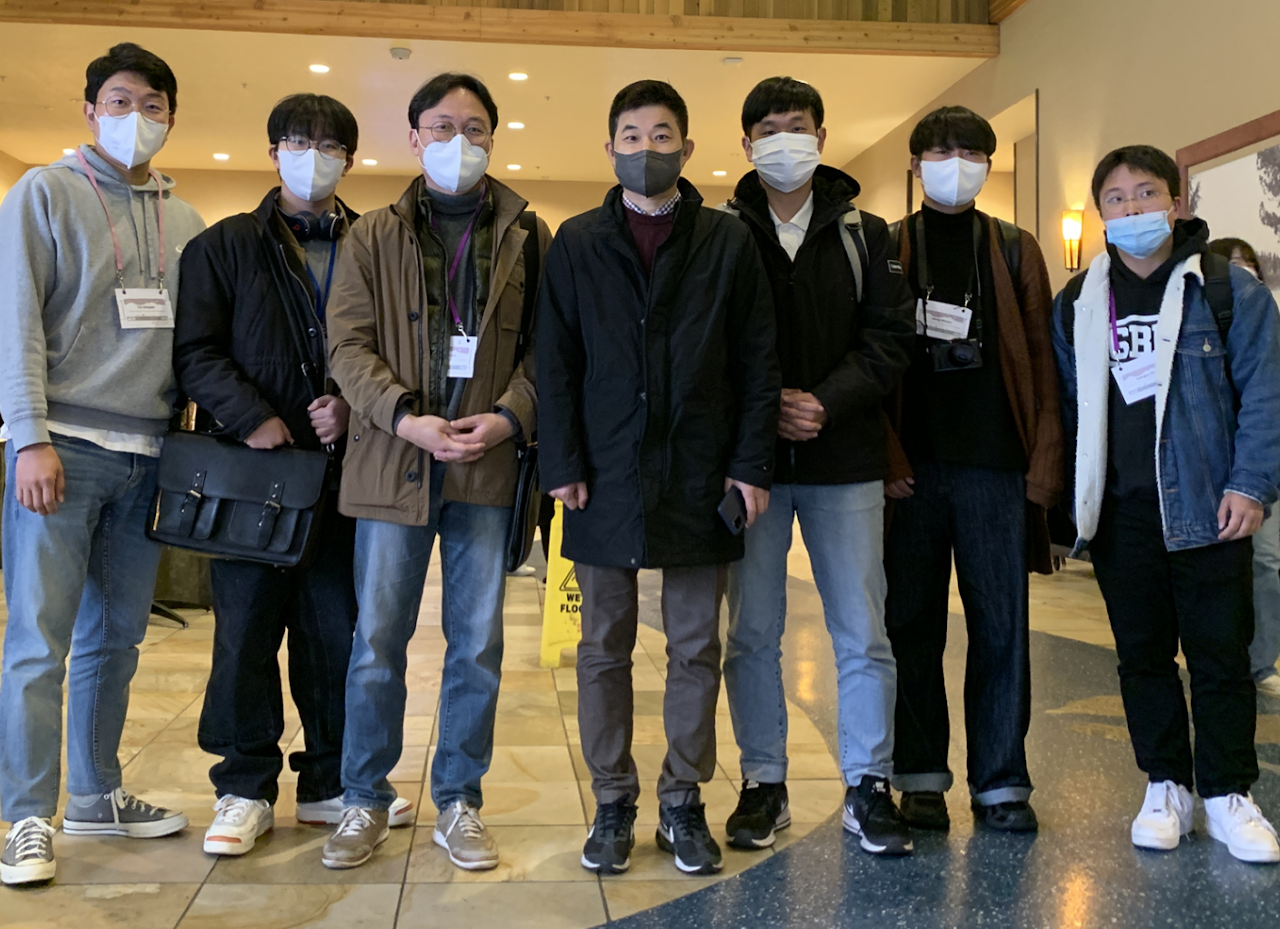 Indoor group photo at UIST 2022.