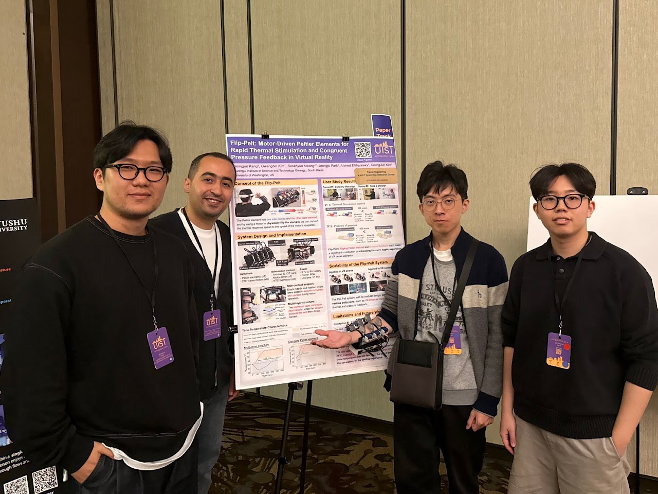 Group photo beside the Flip-Pelt poster at UIST 2024.